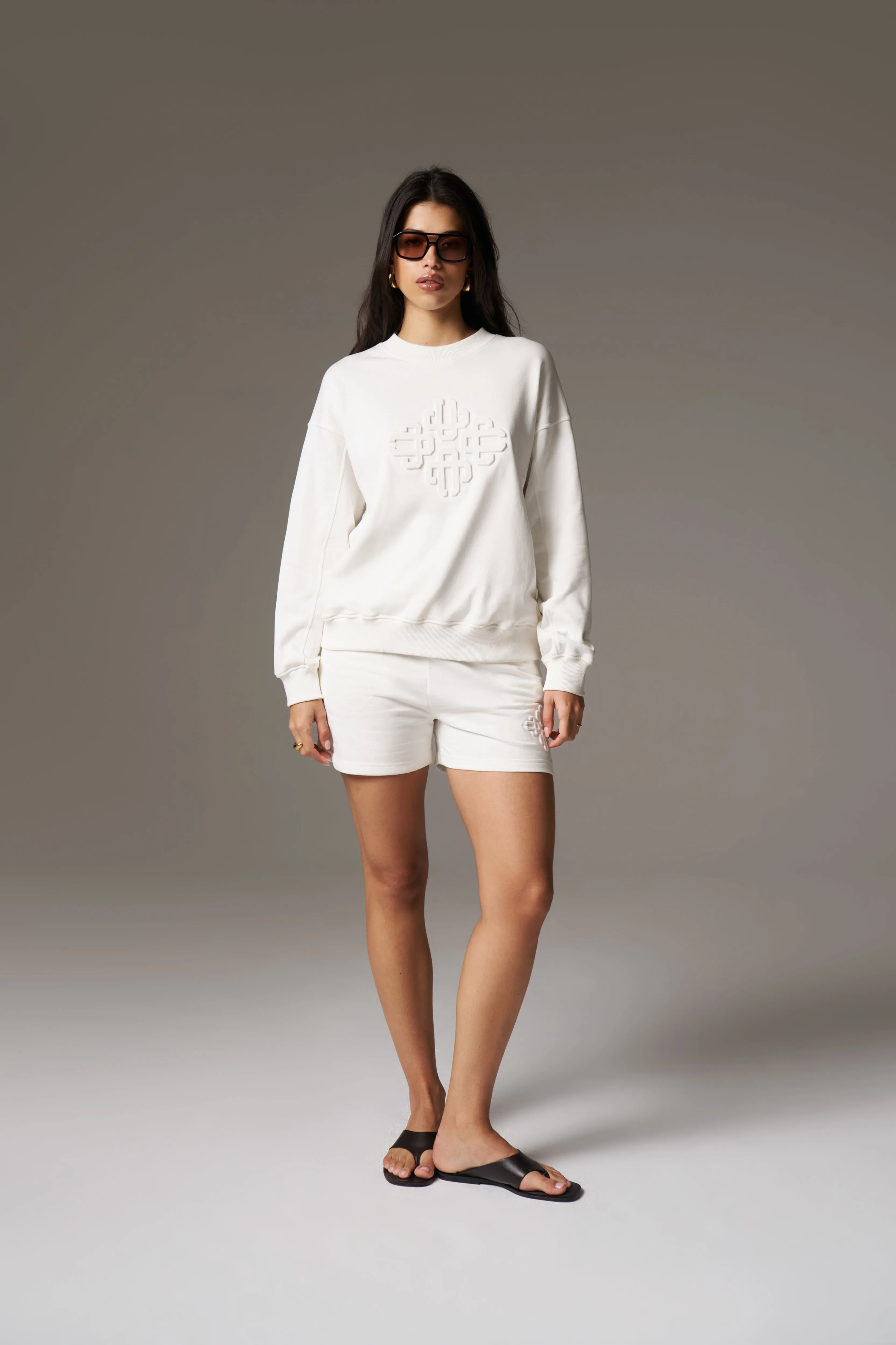 EMBLEM EMBOSSED SHORTS - OFF WHITE